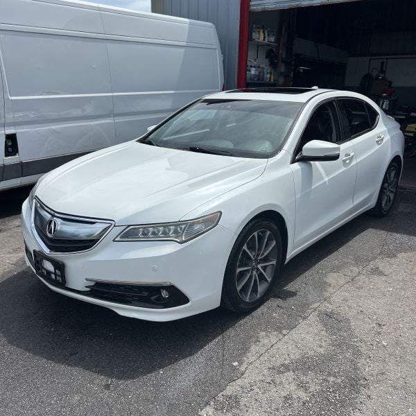 2015 Acura TLX V6 Advance in Bellanova White Pearl — front three-quarter view