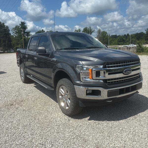2018 Ford F-150 XLT in Magnetic — front three-quarter view