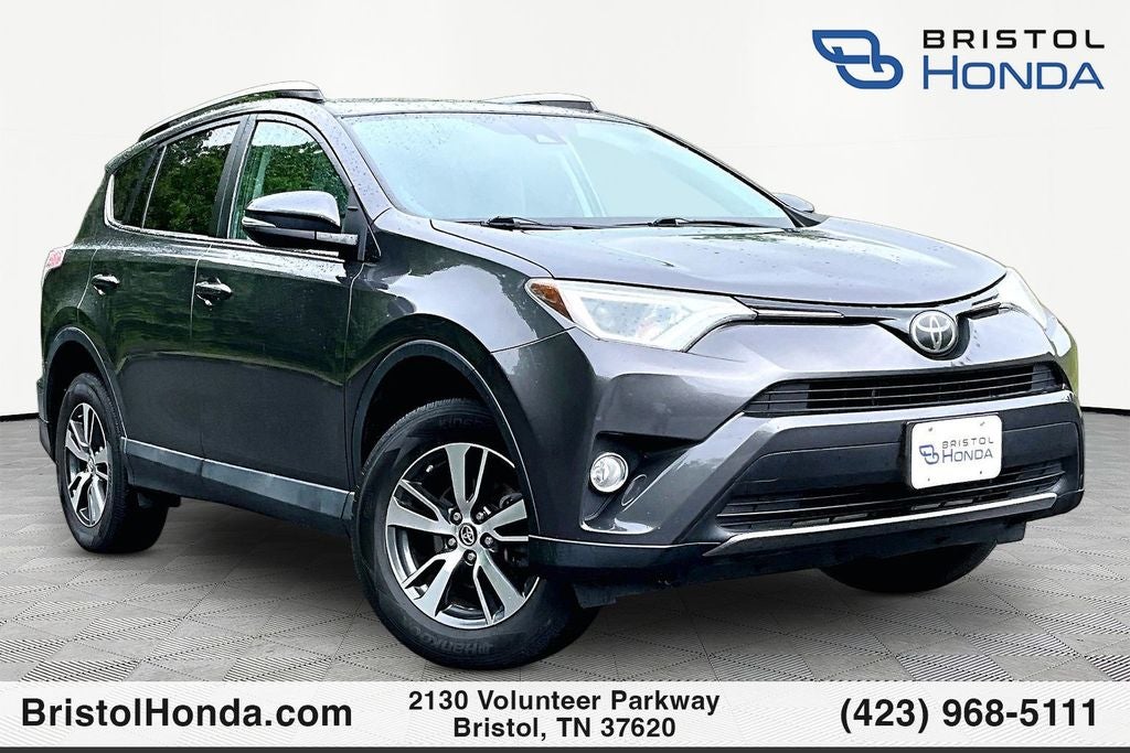 2018 Toyota RAV4 XLE in Magnetic Gray Metallic — front three-quarter view