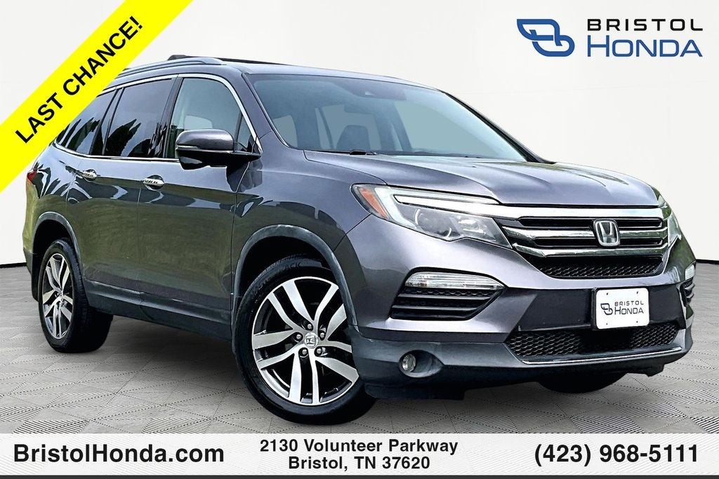 2017 Honda Pilot Touring in Modern Steel Metallic — front three-quarter view