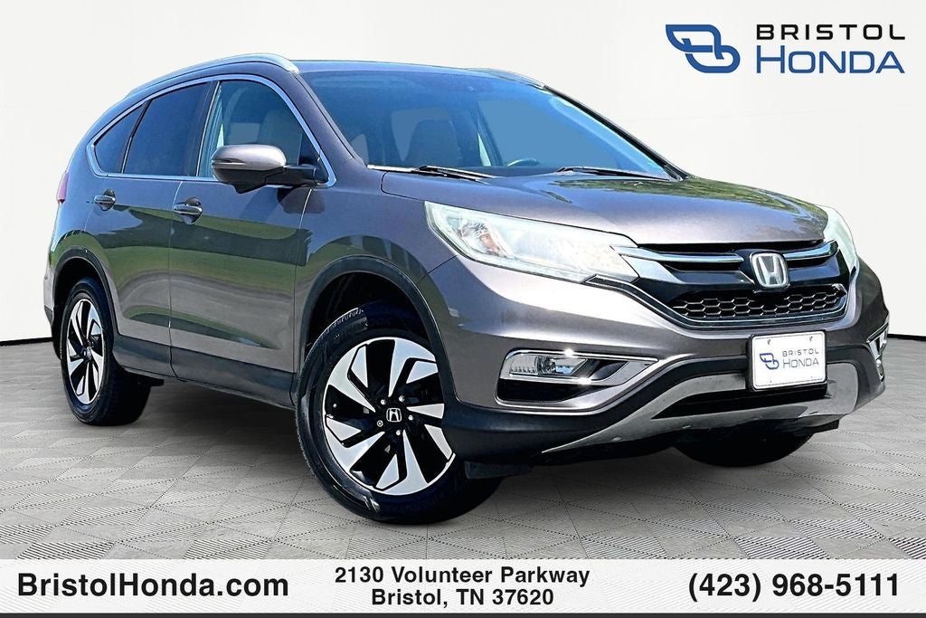 2016 Honda CR-V Touring in Urban Titanium Metallic — front three-quarter view